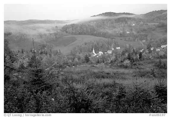 East Corinth village in fall with morning fog. Vermont, New England, USA