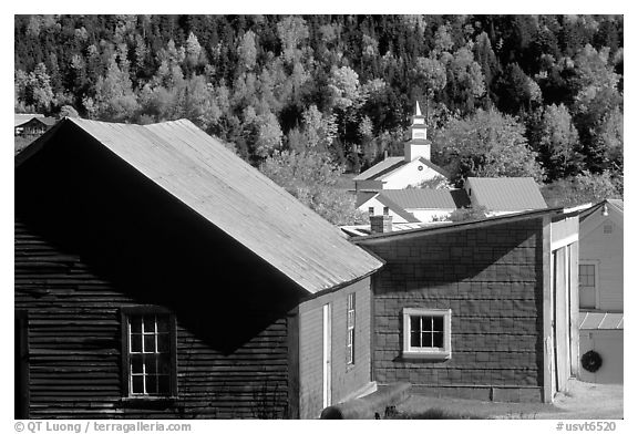 Red barn and East Topsham village in fall. Vermont, New England, USA (black and white)