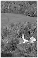 Church of East Corinth among trees in fall color. Vermont, New England, USA (black and white)