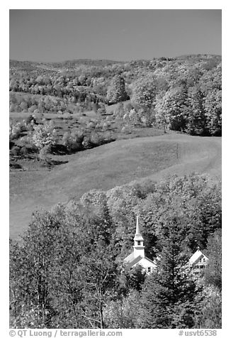 Church of East Corinth among trees in autumn color. Vermont, New England, USA (black and white)