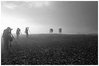 Photographers at sunrise near Jenne Farm. Vermont, New England, USA ( black and white)