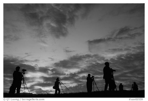 Photographers at sunrise near Jenne Farm. Vermont, New England, USA (black and white)