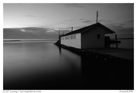 Lake Superior and wharf at dusk, Apostle Islands National Lakeshore. Wisconsin, USA