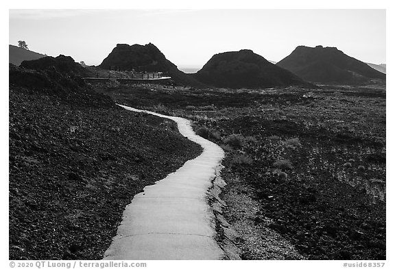 Trail and spatter cones. Craters of the Moon National Monument and Preserve, Idaho, USA