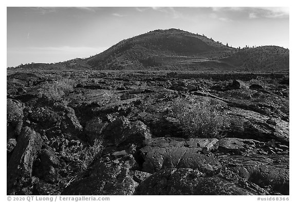 Lava flow and Big Cinder Butte. Craters of the Moon National Monument and Preserve, Idaho, USA (black and white)