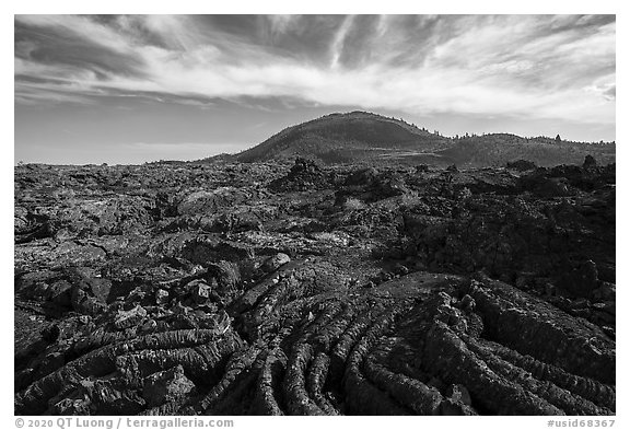 Pahoehoe lava and Big Cinder Butte. Craters of the Moon National Monument and Preserve, Idaho, USA (black and white)