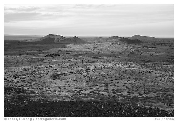Watchman and Sentinel cinder cones from Echo Crater. Craters of the Moon National Monument and Preserve, Idaho, USA (black and white)