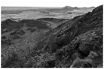 Echo Crater with Watchman cinder cone in the distance. Craters of the Moon National Monument and Preserve, Idaho, USA ( black and white)