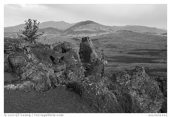 Colorful lava rocks of Echo Crater, Big Cinder Butte, and Pioneer Mountains. Craters of the Moon National Monument and Preserve, Idaho, USA (black and white)
