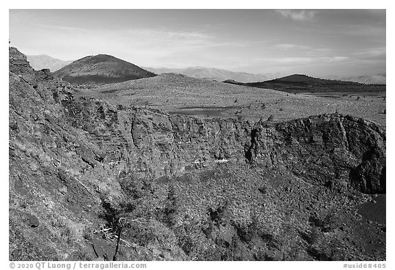Walls of Echo Crater, Big Cinder Butte, Coyotte Butte, and Half Cone. Craters of the Moon National Monument and Preserve, Idaho, USA (black and white)