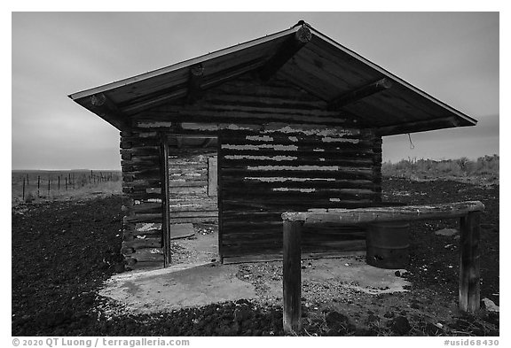 Trapper cabin at night, South Park Well. Craters of the Moon National Monument and Preserve, Idaho, USA (black and white)