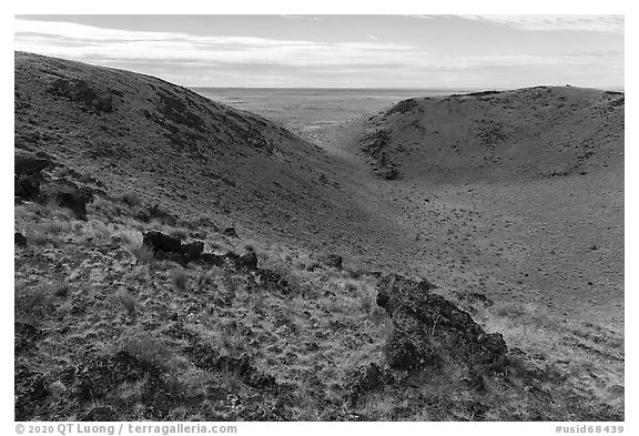 Bear Den Butte with breach in crater. Craters of the Moon National Monument and Preserve, Idaho, USA