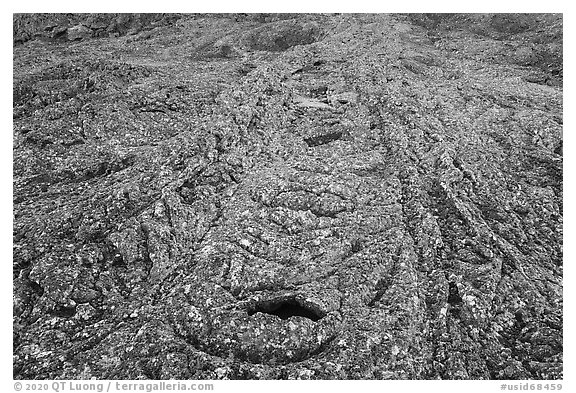 Pahoehoe lava cascades from Pilar Butte. Craters of the Moon National Monument and Preserve, Idaho, USA