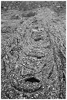 Cascades of Pahoehoe lava from Pilar Butte. Craters of the Moon National Monument and Preserve, Idaho, USA ( black and white)