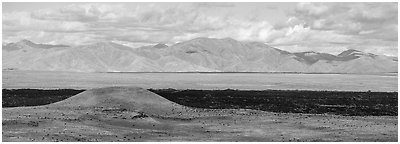 Grassy Lava Flow and Pioneer Mountains. Craters of the Moon National Monument and Preserve, Idaho, USA (Panoramic black and white)