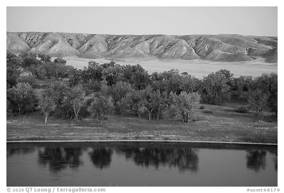 Missouri River, cottonwoods and badlands. Upper Missouri River Breaks National Monument, Montana, USA (black and white)