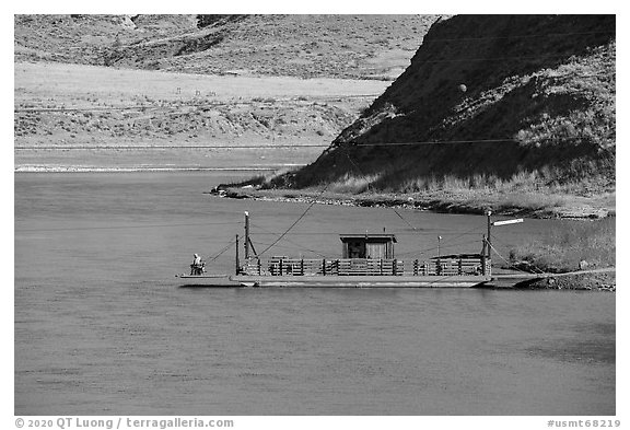 Operator fishing on McClelland Stafford Ferry. Upper Missouri River Breaks National Monument, Montana, USA (black and white)