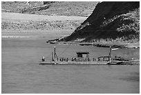 Operator fishing on McClelland Stafford Ferry. Upper Missouri River Breaks National Monument, Montana, USA ( black and white)