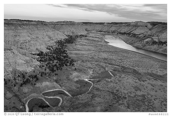 Aerial view of creek meanders and Missouri River valley. Upper Missouri River Breaks National Monument, Montana, USA (black and white)