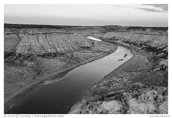 Aerial view of Missouri River surrounded by rugged badlands. Upper Missouri River Breaks National Monument, Montana, USA (black and white)