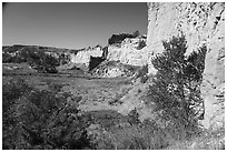 Sandstone cliffs surround native campsite. Upper Missouri River Breaks National Monument, Montana, USA ( black and white)