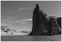 Dark igneous plug at the edge of river. Upper Missouri River Breaks National Monument, Montana, USA ( black and white)