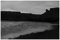 Distant Hole-in-the-Wall at sunrise. Upper Missouri River Breaks National Monument, Montana, USA ( black and white)