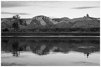 Riverbank with cliff and spires at sunset. Upper Missouri River Breaks National Monument, Montana, USA ( black and white)