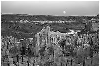 Spires, Missouri River, and moon, Hole-in-the-Wall. Upper Missouri River Breaks National Monument, Montana, USA ( black and white)