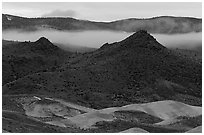 Buttes and fog at dusk. John Day Fossils Bed National Monument, Oregon, USA ( black and white)