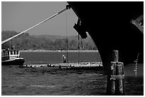 Timber, tugboat, and cargo boat bow. Oregon, USA ( black and white)