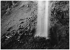 Mossy basin and waterfall base, Watson Falls. USA ( black and white)