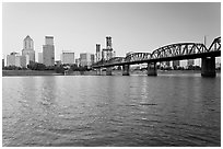 Portland skyline, Hawthorne Bridge, and Williamette River at sunrise. Portland, Oregon, USA ( black and white)