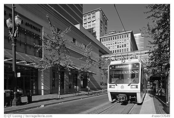 Street with tram, downtown. Portland, Oregon, USA (black and white)
