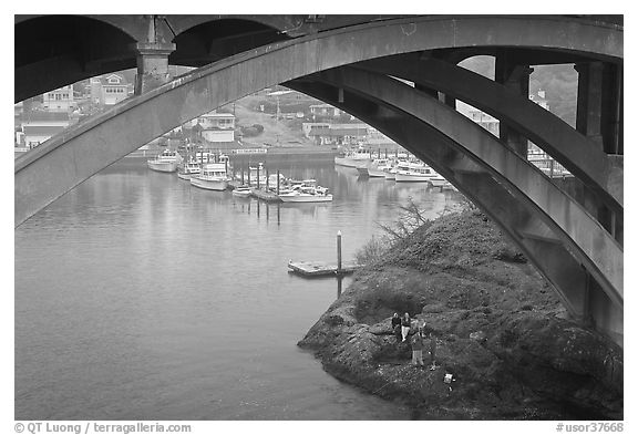 Depoe Bay Harbor from under highway bridge. Oregon, USA (black and white)