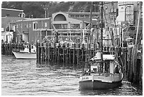 Fishing boats and pier. Newport, Oregon, USA (black and white)
