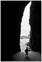 Infant and sea cave opening from inside. Bandon, Oregon, USA (black and white)