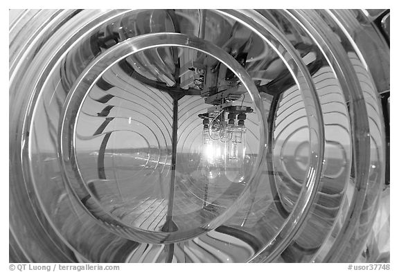 Light and Fresnel lens inside Cape Blanco Lighthouse. Oregon, USA (black and white)