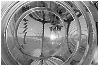 Light and Fresnel lens inside Cape Blanco Lighthouse. Oregon, USA ( black and white)