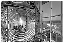 Light inside Cape Blanco Lighthouse tower and landscape. Oregon, USA (black and white)