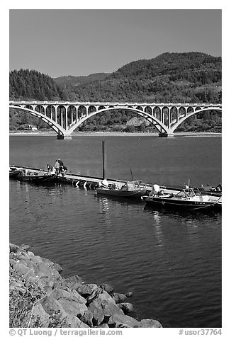 Boat deck and arched bridge, Rogue River. Oregon, USA (black and white)