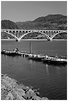 Boat deck and arched bridge, Rogue River. Oregon, USA (black and white)