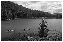 Kayaks on emerald waters, Devils Lake, Deschutes National Forest. Oregon, USA (black and white)