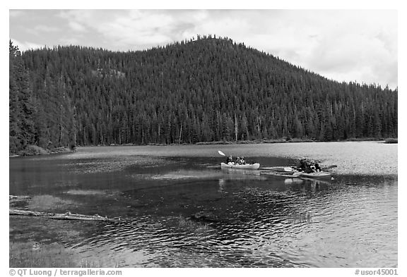 Family kayaking on Devils Lake. Oregon, USA (black and white)