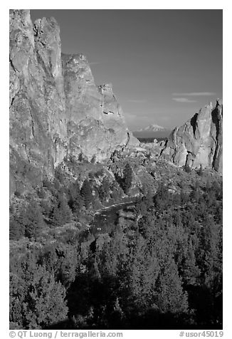 Snow-capped mountain seen through cliffs. Smith Rock State Park, Oregon, USA (black and white)