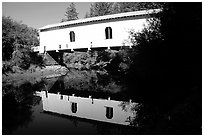 White covered Bridge reflected in river, Willamette Valley. Oregon, USA ( black and white)