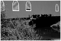 Detail of red covered bridge and river, Willamette Valley. Oregon, USA ( black and white)