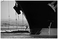 Cargo ship loading floated timber, Coos Bay. Oregon, USA ( black and white)