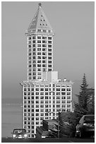 Smith Tower and cars on steep street, early morning. Seattle, Washington ( black and white)