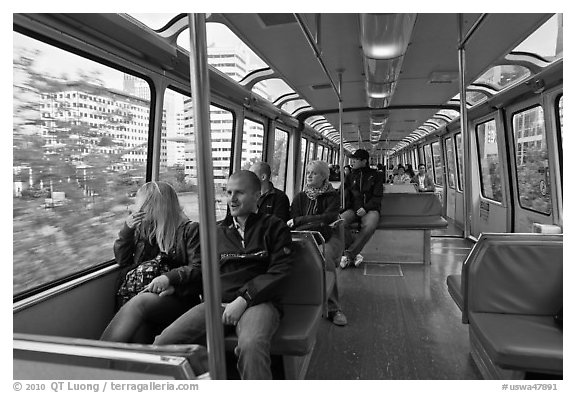 Riders in monorail. Seattle, Washington (black and white)